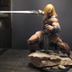 Illustration for article titled Artist builds beautiful He-Man sculpture with biceps the size of honey baked hams